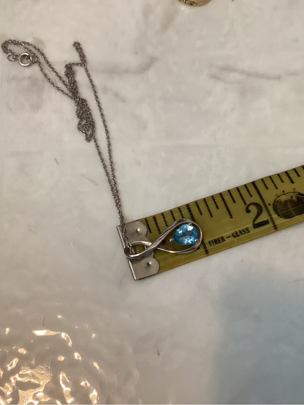 Sterling blue stone matching necklace and earrings.